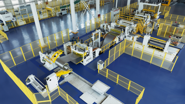 An overhead view of a large industrial facility featuring a complete Hydraulic Coil Slitting Machine production line. The machinery, primarily white and yellow, is arranged in a linear sequence on a blue floor, processing a large metal coil, and is surrounded by yellow safety fencing.