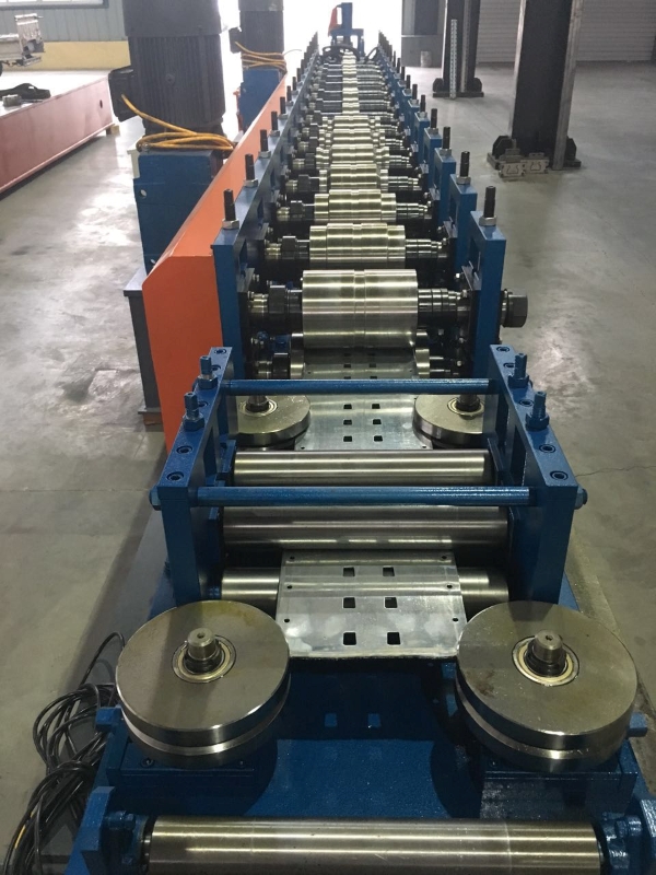 Close view of shelf upright roll forming machine
