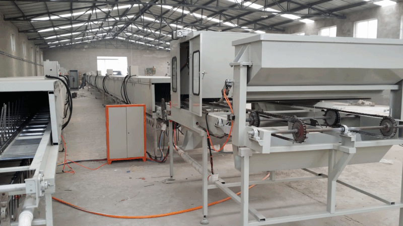 New stone-coated machine displayed in static, non-operational position for product showcase.